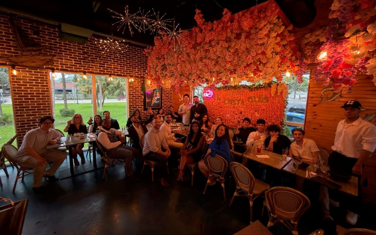 Chris Island with the Checkmate Financial Group team at a team dinner